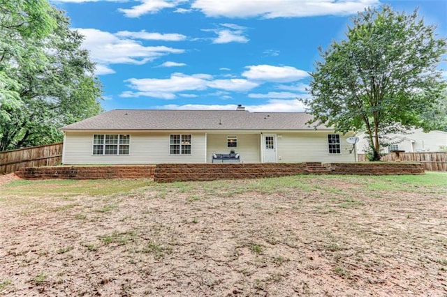 1227 Casper Ln, Winder, GA 30680 - rear view of property featuring a fenced backyard and a patio