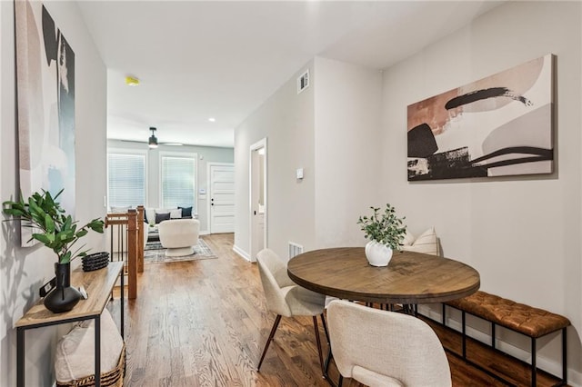 dining room with hardwood / wood-style floors