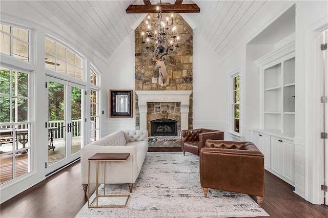 living room with wood ceiling, high vaulted ceiling, dark wood-style flooring, and a stone fireplace