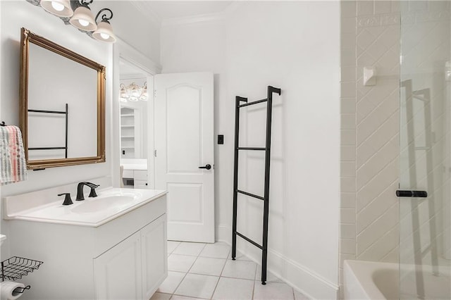 full bath with ornamental molding, vanity, and tile patterned floors