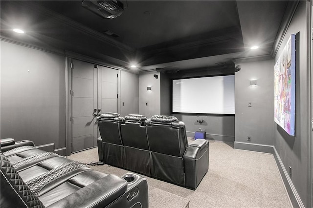 home theater room with light carpet, baseboards, ornamental molding, and recessed lighting