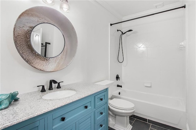 bathroom featuring crown molding, toilet, tub / shower combination, vanity, and tile patterned floors