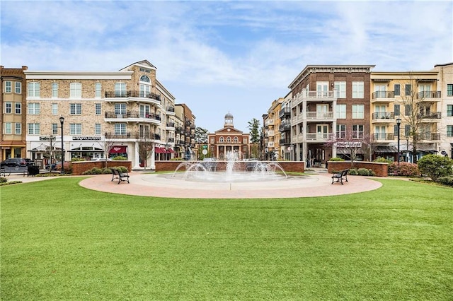 view of home's community featuring a yard