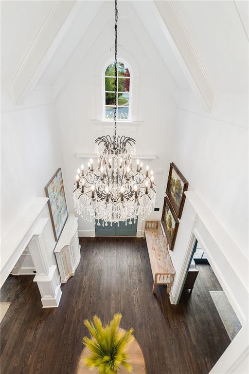 living room with dark wood-style floors and lofted ceiling