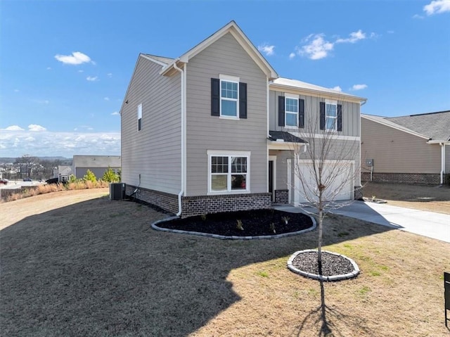 view of front facade featuring a garage, concrete driveway, brick siding, and cooling unit