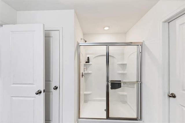 bathroom featuring a stall shower