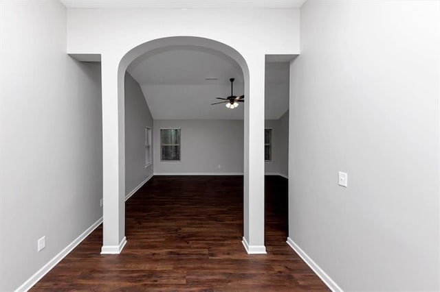 hallway with dark wood-type flooring