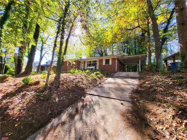 single story home with a carport