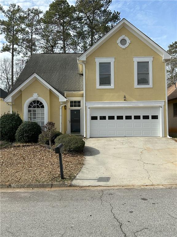 view of property featuring a garage