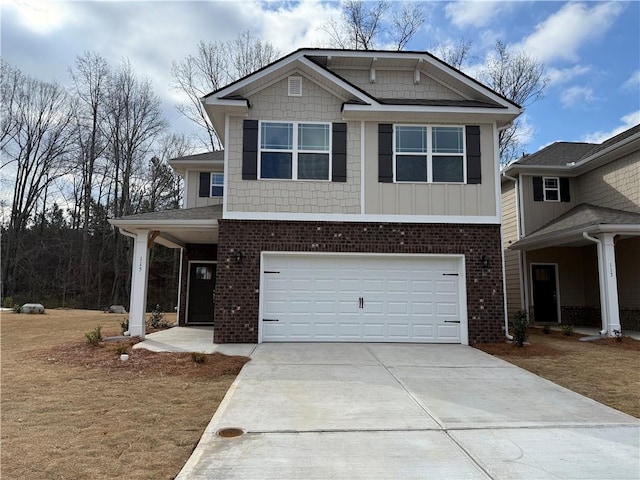 craftsman-style house with concrete driveway, a garage, and brick siding