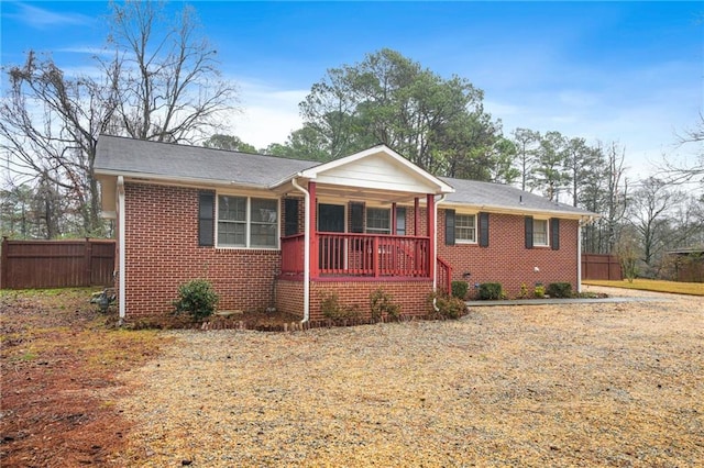 single story home with covered porch