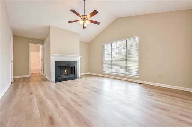 unfurnished living room featuring ceiling fan, light wood-type flooring, and high vaulted ceiling