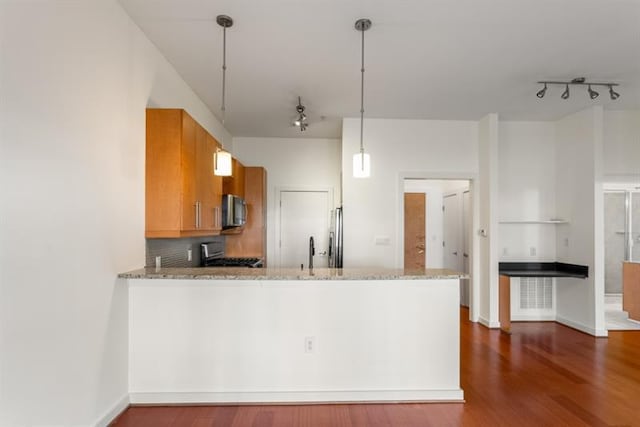 870 Inman Village Pkwy Unit 203, Atlanta, GA 30307 - kitchen with range, stainless steel microwave, track lighting, and light stone counters