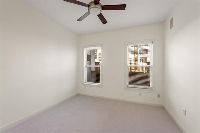870 Inman Village Pkwy Unit 203, Atlanta, GA 30307 - empty room featuring light colored carpet and a ceiling fan