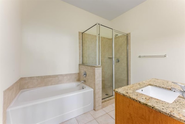 870 Inman Village Pkwy Unit 203, Atlanta, GA 30307 - full bath with tile patterned flooring, vanity, a bath, and a stall shower