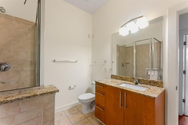 870 Inman Village Pkwy Unit 203, Atlanta, GA 30307 - full bath with a tile shower, vanity, and tile patterned flooring