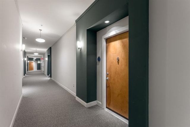 870 Inman Village Pkwy Unit 203, Atlanta, GA 30307 - corridor featuring carpet floors and baseboards