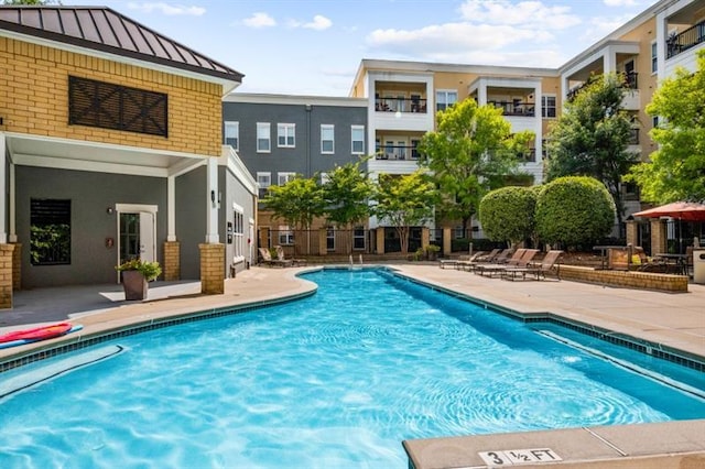 870 Inman Village Pkwy Unit 203, Atlanta, GA 30307 - community pool featuring a patio