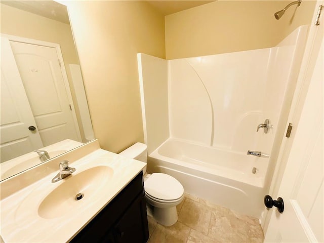 full bath featuring  shower combination, vanity, and toilet