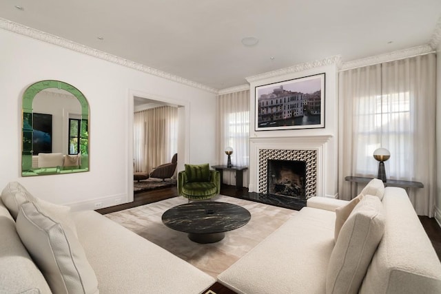 31 Lafayette Dr NE, Atlanta, GA 30309 - living area featuring ornamental molding, wood finished floors, baseboards, and a tiled fireplace
