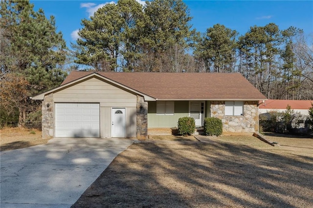 ranch-style house featuring a garage