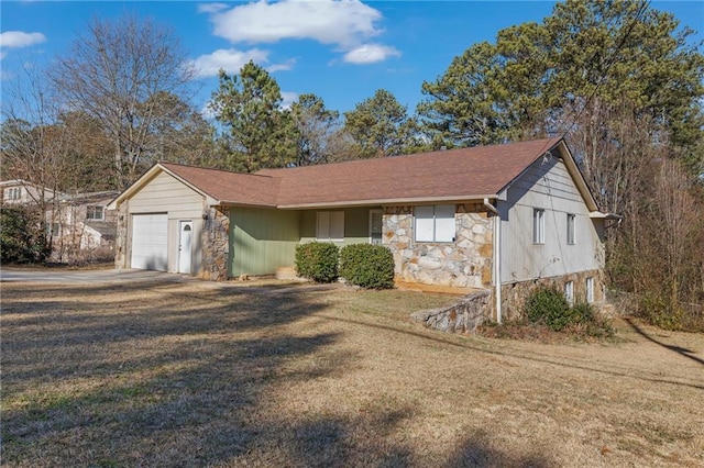 ranch-style home featuring a garage