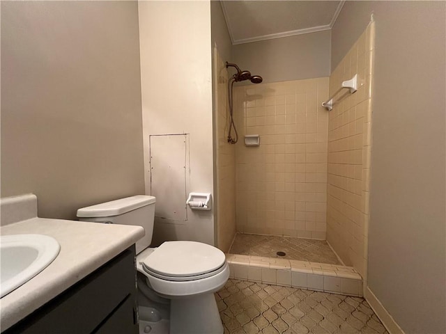 2065 Sandgate Cir, Atlanta, GA 30349 - bathroom featuring vanity, a stall shower, ornamental molding, toilet, and tile patterned floors