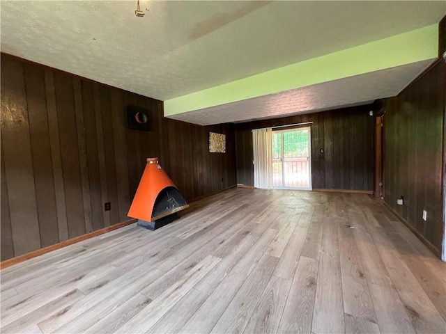 2065 Sandgate Cir, Atlanta, GA 30349 - unfurnished room with wooden walls and light wood finished floors