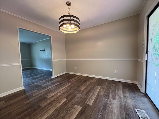 2065 Sandgate Cir, Atlanta, GA 30349 - spare room with a chandelier, dark wood-style floors, baseboards, and crown molding