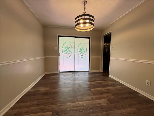 2065 Sandgate Cir, Atlanta, GA 30349 - unfurnished dining area with ornamental molding, dark wood-style flooring, baseboards, and a chandelier