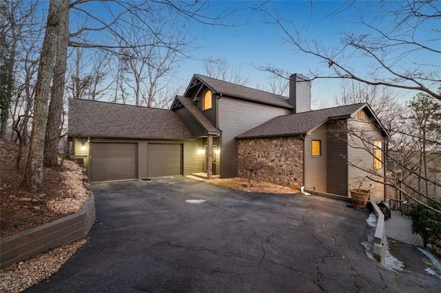 view of front of property with a garage