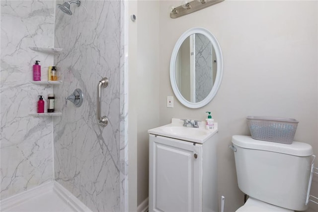 4699 Ballew Dr, Powder Springs, GA 30127 - bathroom with toilet, vanity, and a marble finish shower