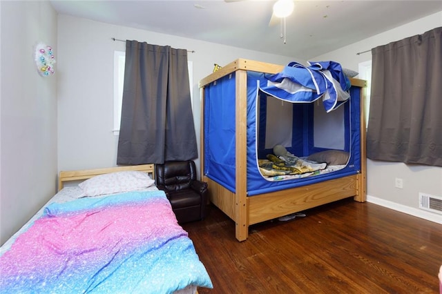 4699 Ballew Dr, Powder Springs, GA 30127 - bedroom featuring wood finished floors, ceiling fan, and visible vents