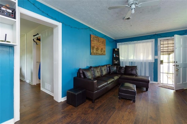 4699 Ballew Dr, Powder Springs, GA 30127 - living room with visible vents, a textured ceiling, hardwood / wood-style floors, and a ceiling fan