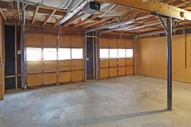 115 Elizabeth Way, Ellenwood, GA 30294 - garage featuring a garage door opener