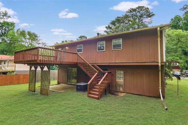 115 Elizabeth Way, Ellenwood, GA 30294 - rear view of house featuring a wooden deck and stairway