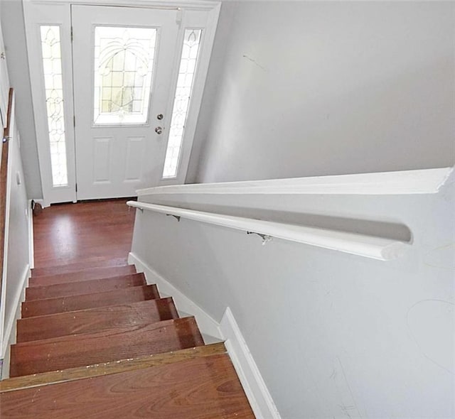 115 Elizabeth Way, Ellenwood, GA 30294 - stairs featuring wood finished floors and baseboards