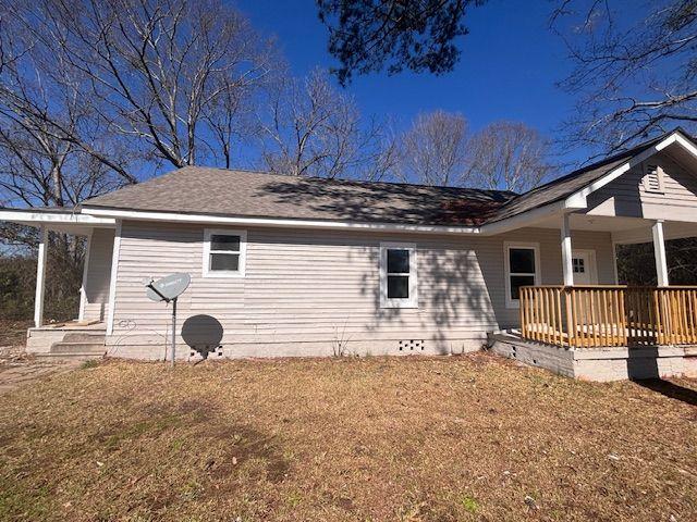 339 Main St, Griffin, GA 30223 - back of house featuring a yard and covered porch