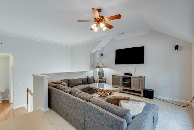 carpeted living room with crown molding, ceiling fan, and lofted ceiling