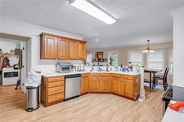 1574 Glenfield Dr, Lawrenceville, GA 30043 - kitchen with stainless steel appliances, a sink, a peninsula, a chandelier, and light countertops