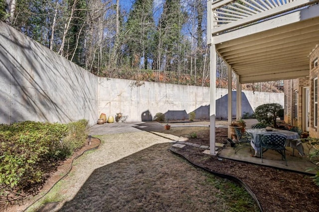 view of yard featuring a fenced backyard and a patio