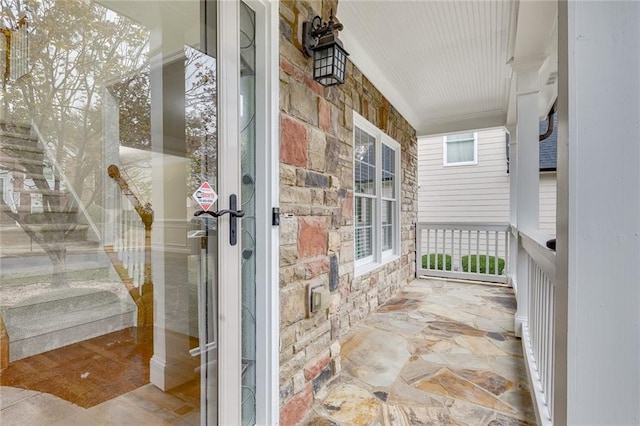 entrance to property with a porch