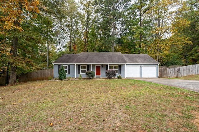 single story home with a front yard and a garage