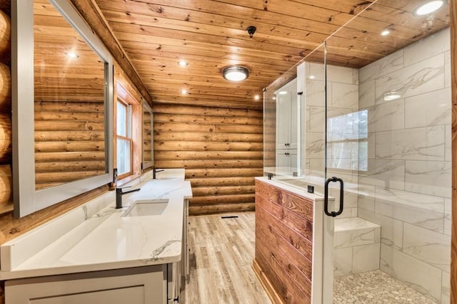 bathroom featuring recessed lighting, a stall shower, vanity, wood finished floors, and wooden ceiling