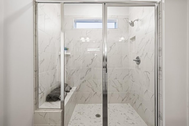 full bathroom featuring a shower stall