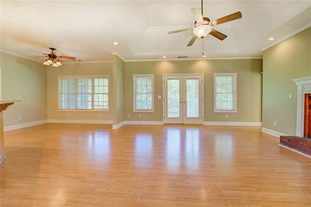 172 Lakeview Dr, Newborn, GA 30056 - unfurnished living room featuring ceiling fan, crown molding, light wood-style flooring, a glass covered fireplace, and recessed lighting