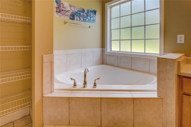 172 Lakeview Dr, Newborn, GA 30056 - bathroom with a bath, vanity, and a walk in closet