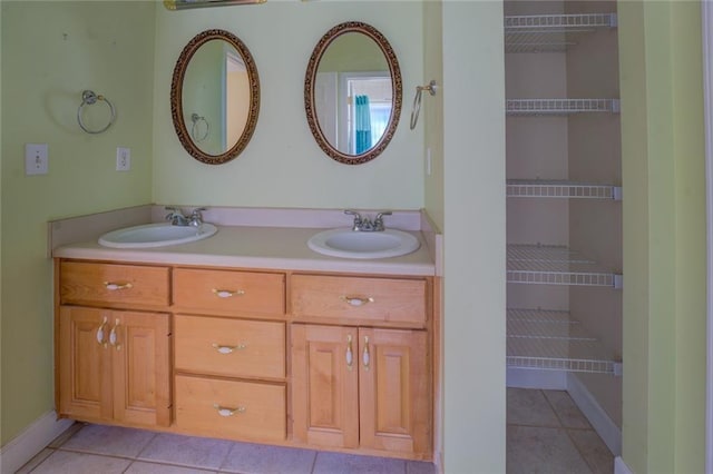 172 Lakeview Dr, Newborn, GA 30056 - bathroom featuring tile patterned floors and double vanity