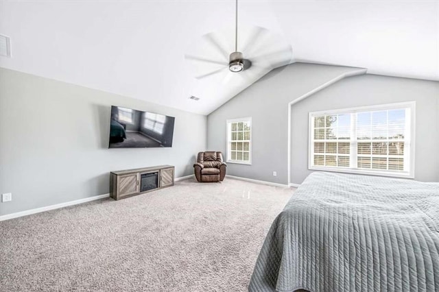 carpeted bedroom with lofted ceiling, ceiling fan, visible vents, and baseboards