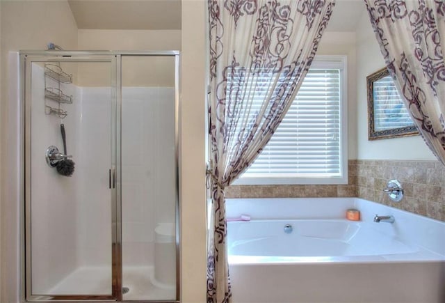 bathroom with independent shower and bath